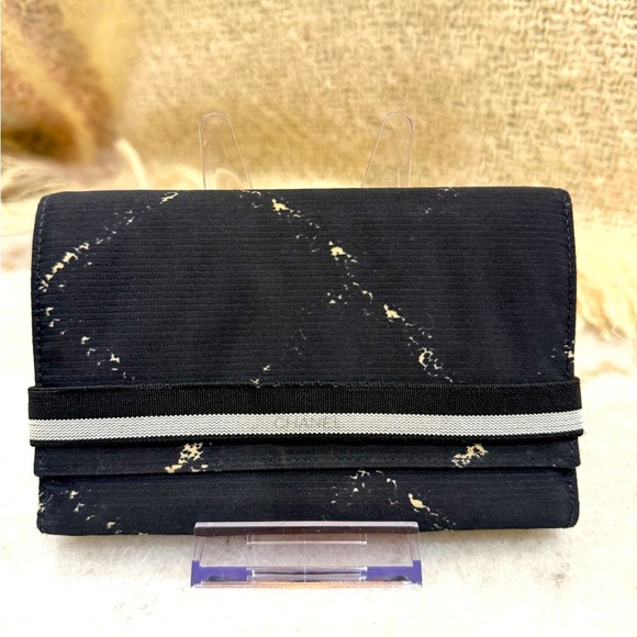 CHANEL Handbags - Chanel Black and White Travel Line Nylon Bifold Long Wallet